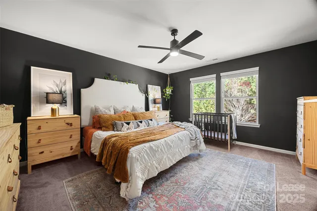 a bed room with a bed and a window