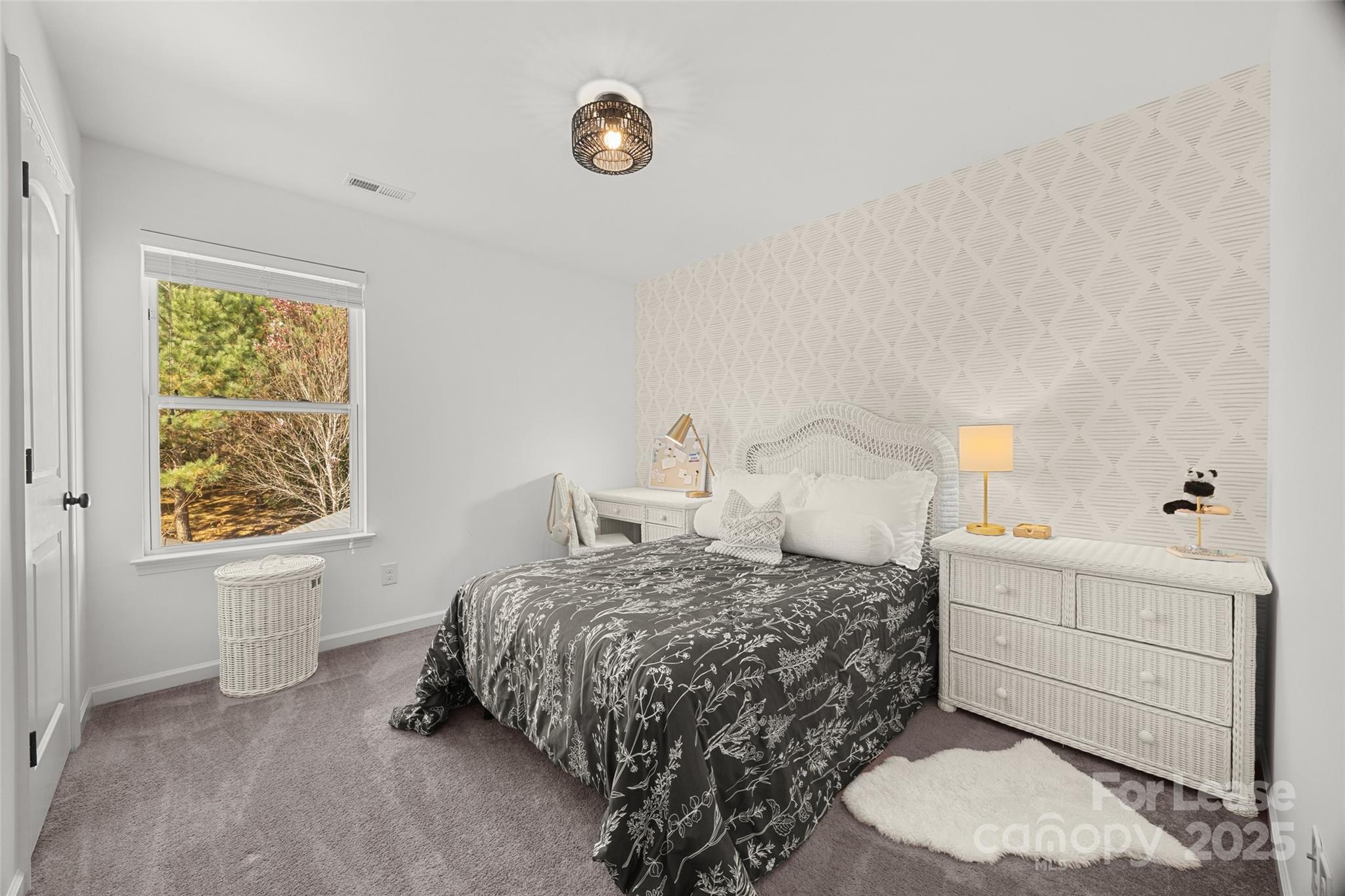 1668 Beleek Ridge Lane Clover, SC 29710 - Photo 22 of 42 a bedroom with a bed and a window