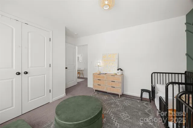 a room with furniture and a window