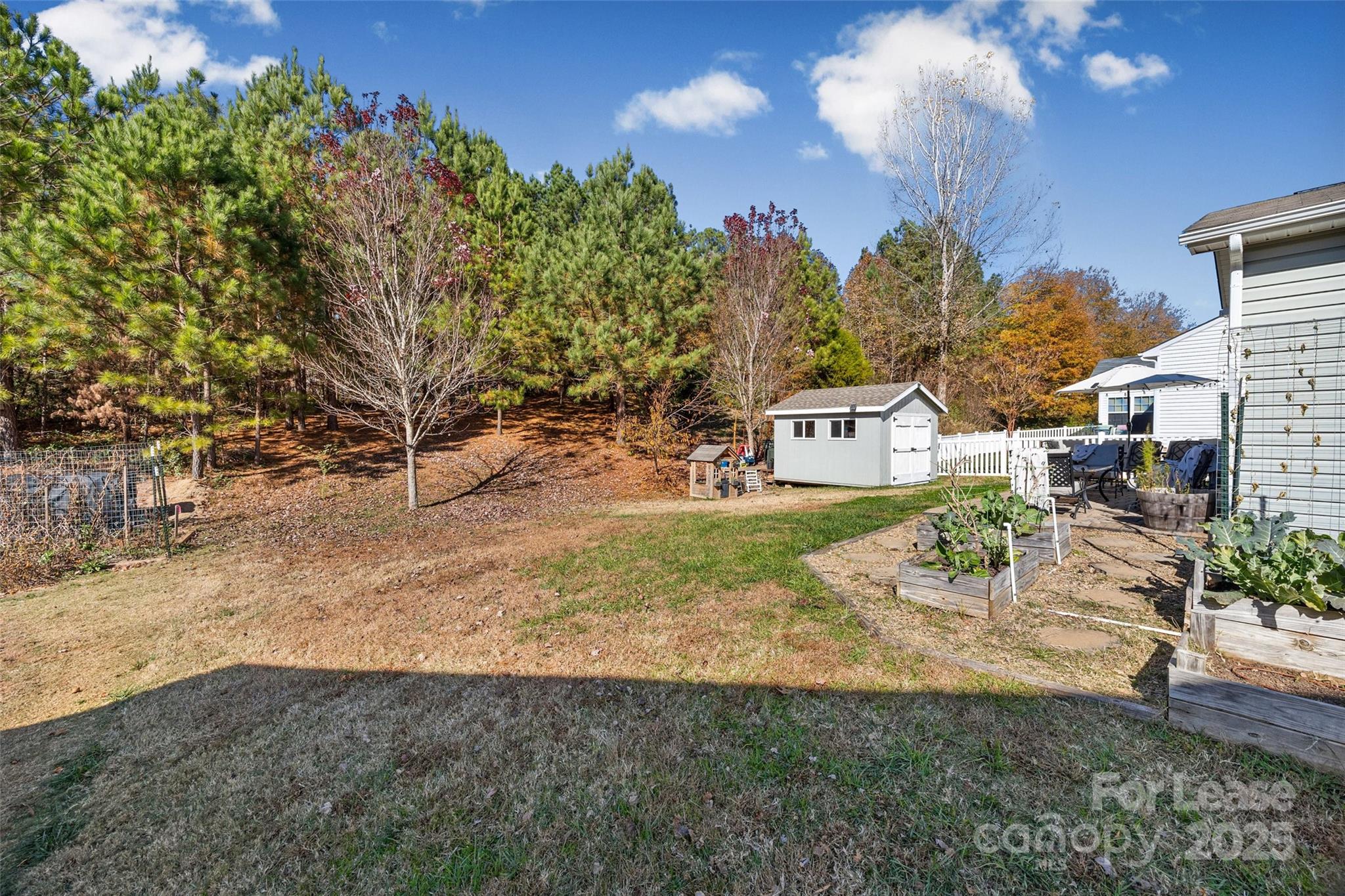 1668 Beleek Ridge Lane Clover, SC 29710 - Photo 31 of 42 a view of a yard with table and chairs