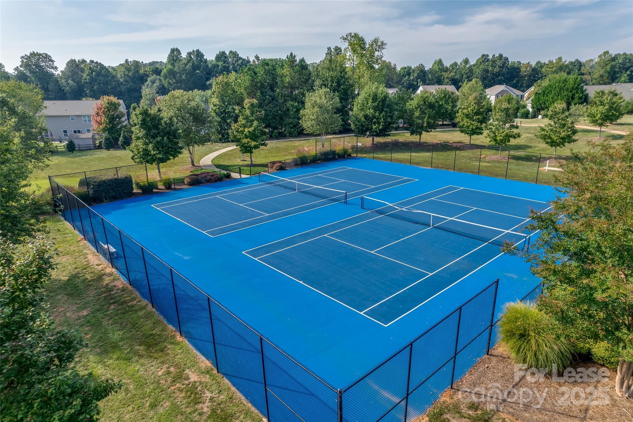 1668 Beleek Ridge Lane Clover, SC 29710 - Photo 39 of 42 a view of a tennis ground with large trees