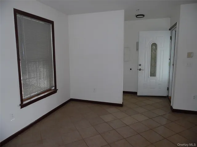 a view of a room that has a large window