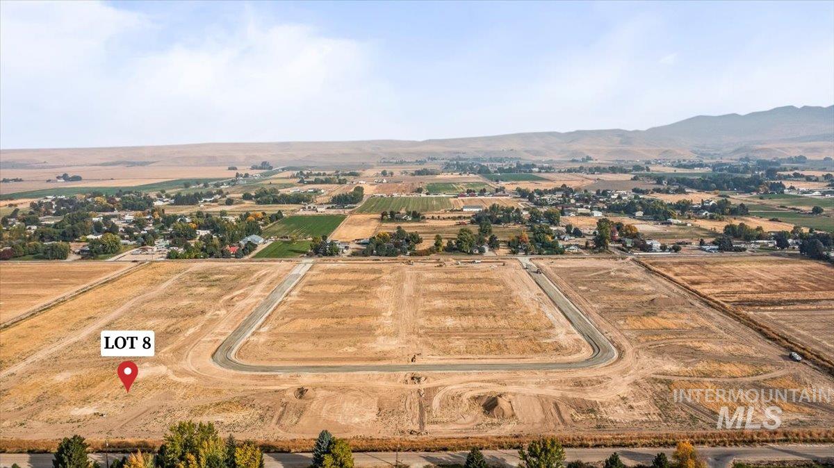 Lot 8 Corbett Road Emmett, ID 83617 - Photo 1 of 5 Aerial view of sparsely populated area featuring a mountain backdrop
