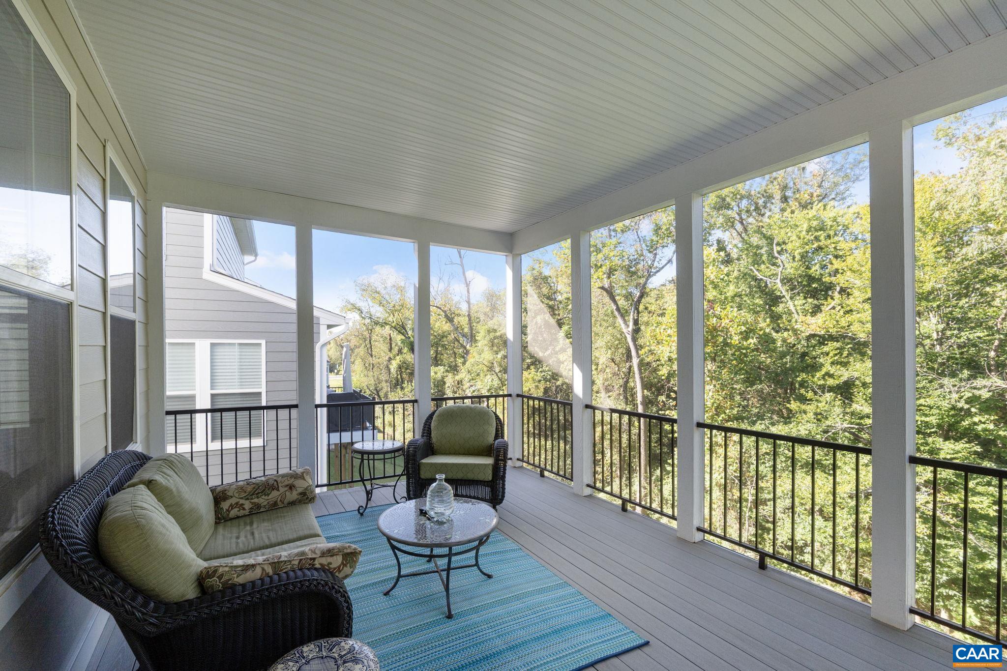 2879 Rambling Brook Lane Crozet, VA 22932 - Photo 19 of 63 a living room with furniture and a large window