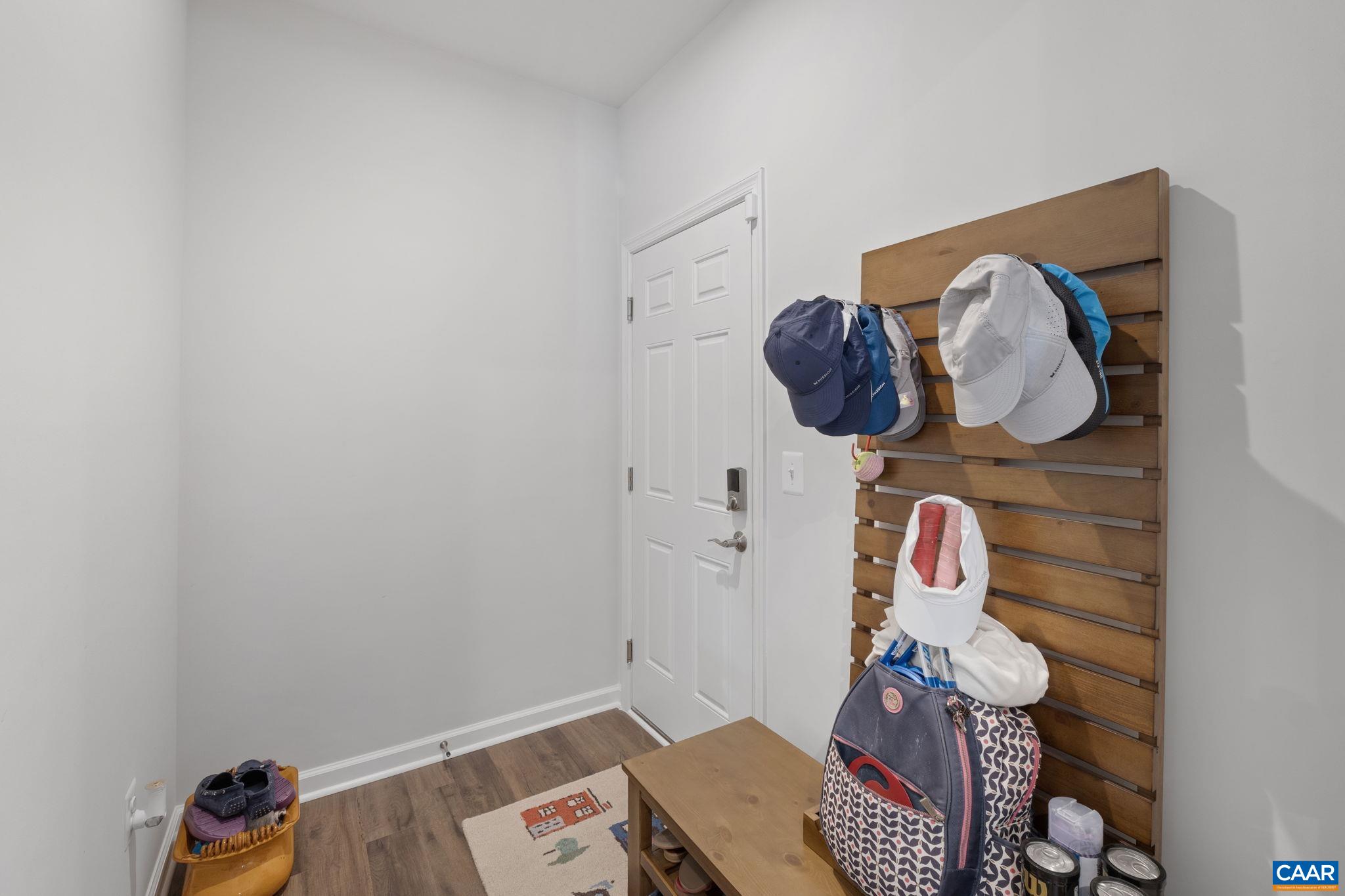 2879 Rambling Brook Lane Crozet, VA 22932 - Photo 22 of 63 a bathroom with a toilet and a shower curtain