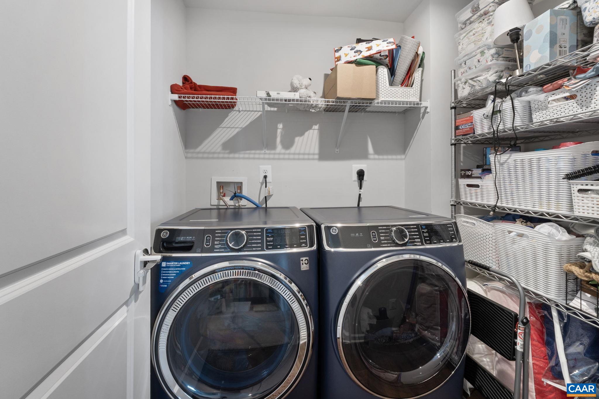 2879 Rambling Brook Lane Crozet, VA 22932 - Photo 32 of 63 a utility room with dryer and washer