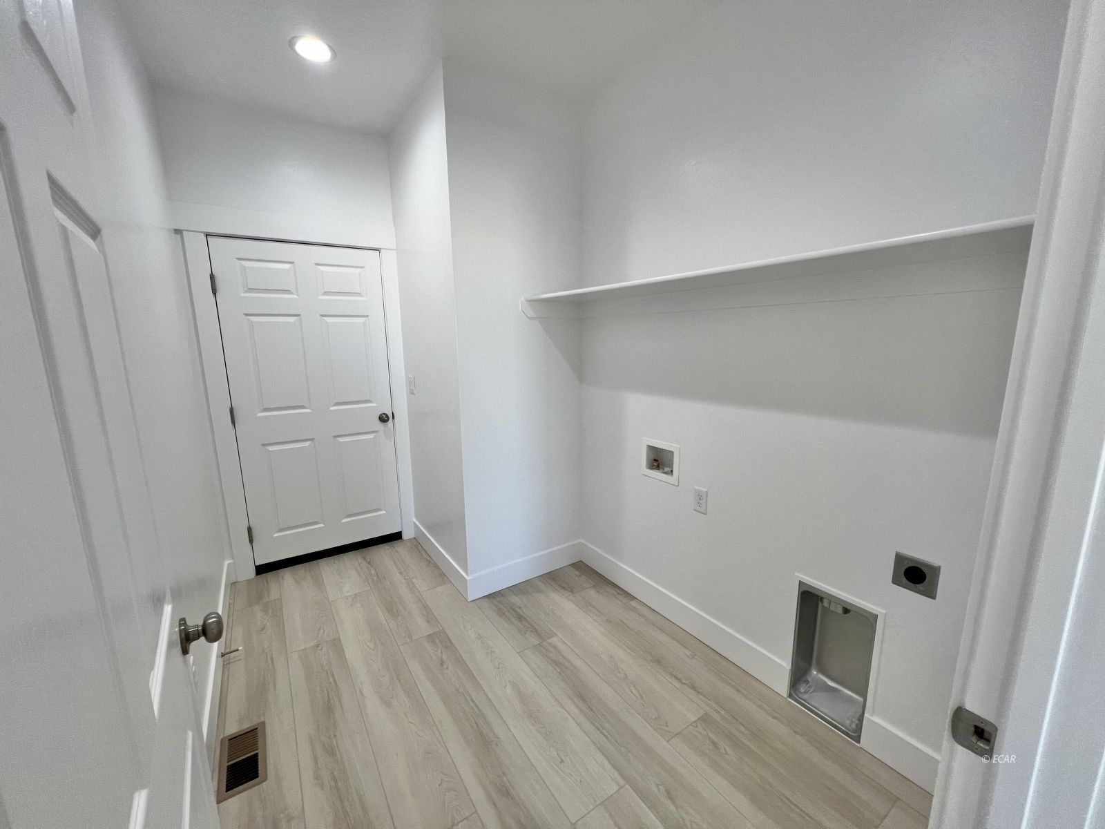 518 Ridgeway Drive Spring Creek, NV 89815 - Photo 6 of 37 an empty room with wooden floor and windows