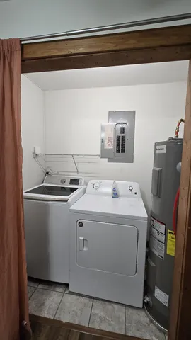 a bathroom with a shower and a sink