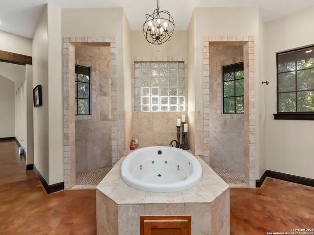 a view of bathroom with dual sinks