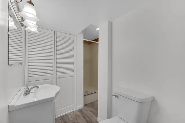 a bathroom with a sink and shower