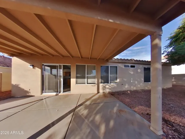 a bathroom with a toilet a sink and shower