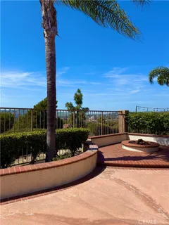 a view of a swimming pool with a yard