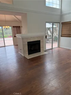 a view of a living room and chair