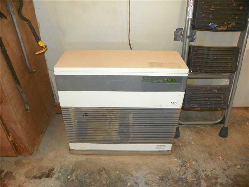 136 Runaround Pond Road Durham, ME 04222 - Photo 27 of 29 Other. Monitor Heater in Workshop