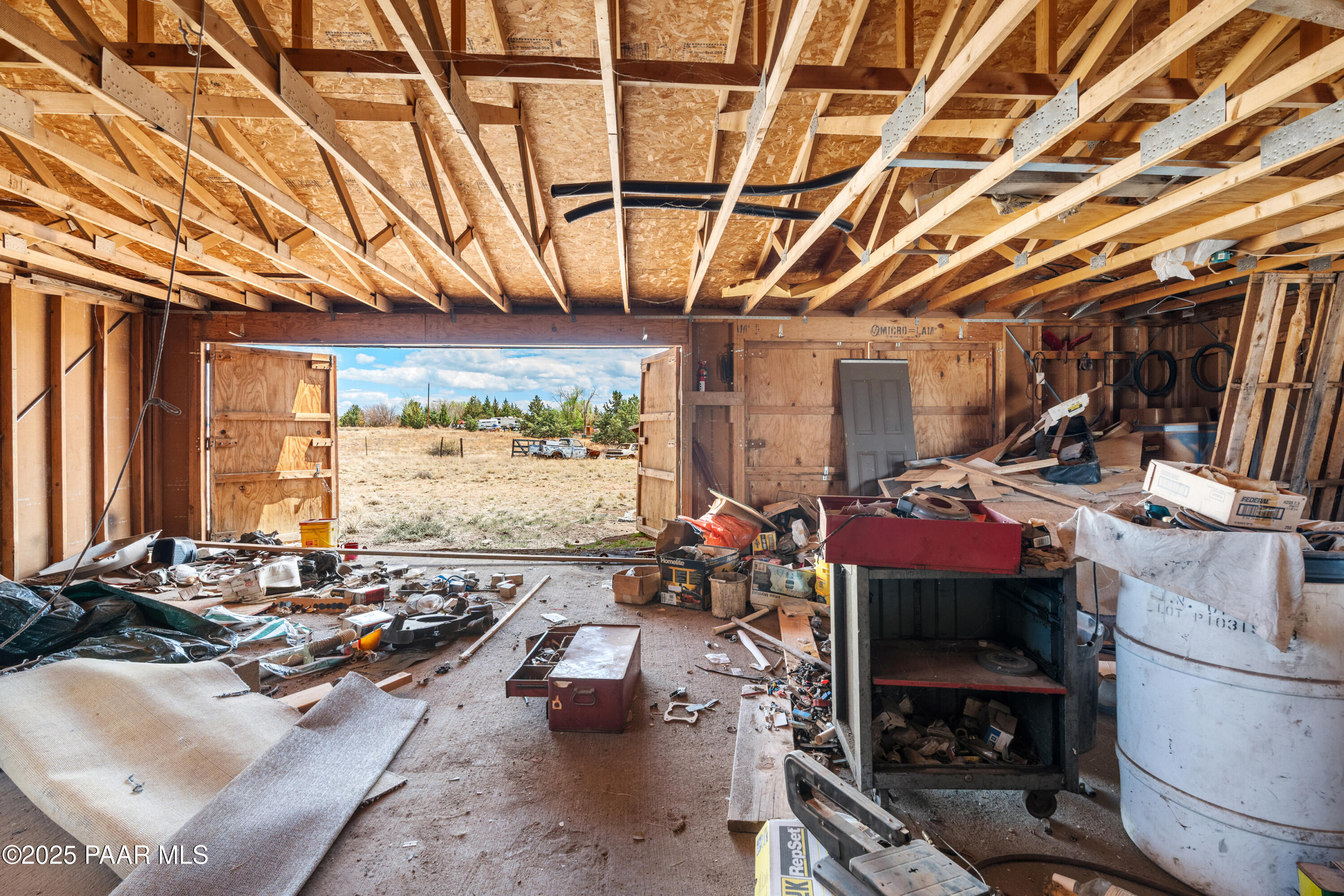 25200 North Stump Road Paulden, AZ 86334 - Photo 5 of 19 a room with lots of furniture and a chandelier