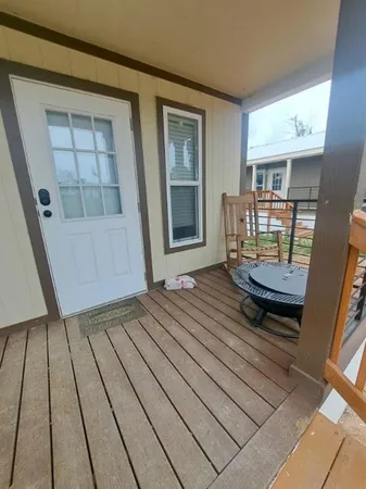 a view of sitting area in front of a house
