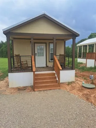 a view of a house with a swimming pool