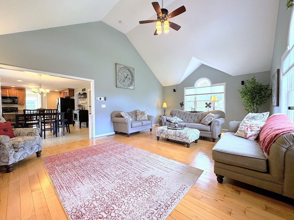 9 Noble Street Dudley, MA 01571 - Photo 14 of 41 a living room with furniture and wooden floor