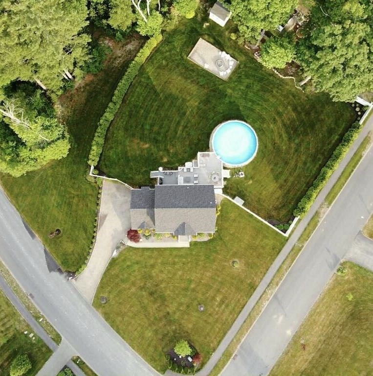 9 Noble Street Dudley, MA 01571 - Photo 36 of 41 a bathroom with a sink and mirror