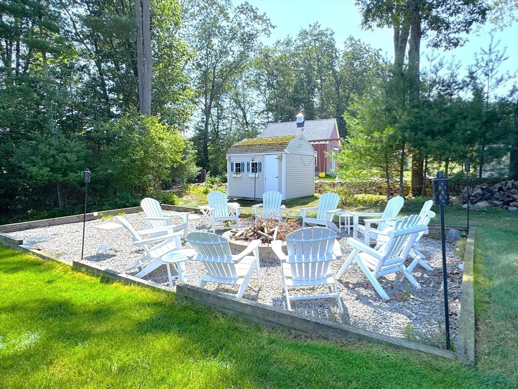 9 Noble Street Dudley, MA 01571 - Photo 39 of 41 a view of a house with backyard and sitting area