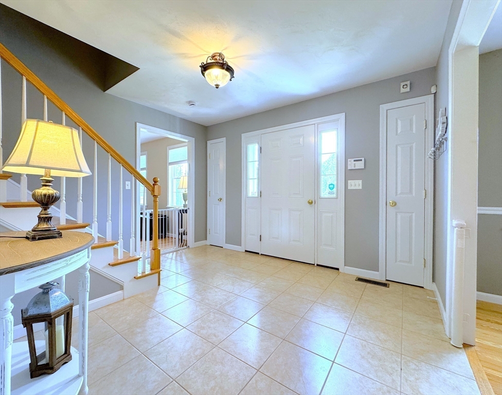 9 Noble Street Dudley, MA 01571 - Photo 4 of 41 a view of an empty room with a window