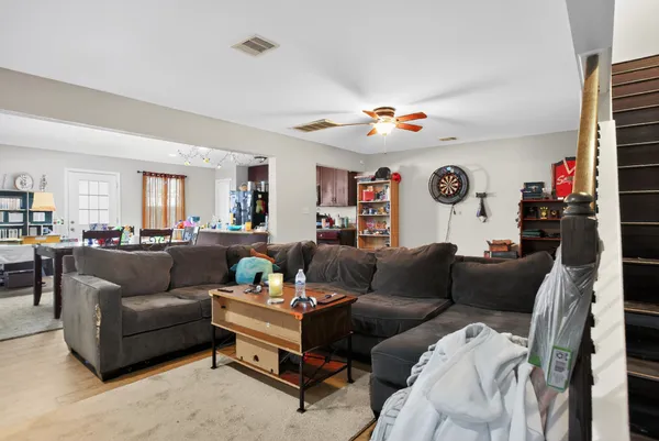 a living room with furniture and a window