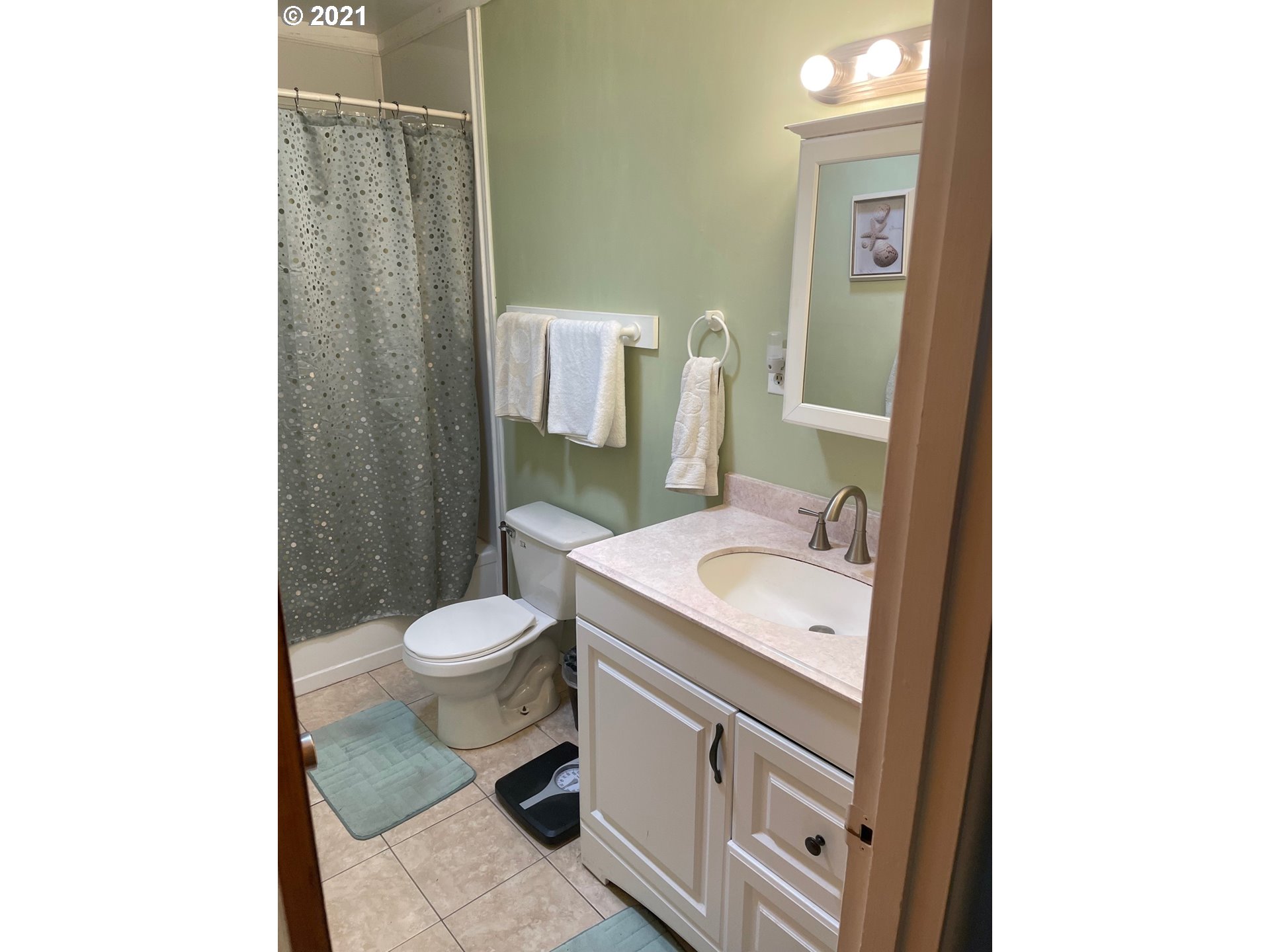 1451 Water Street Springfield, OR 97477 - Photo 12 of 23 a bathroom with a sink toilet and a mirror