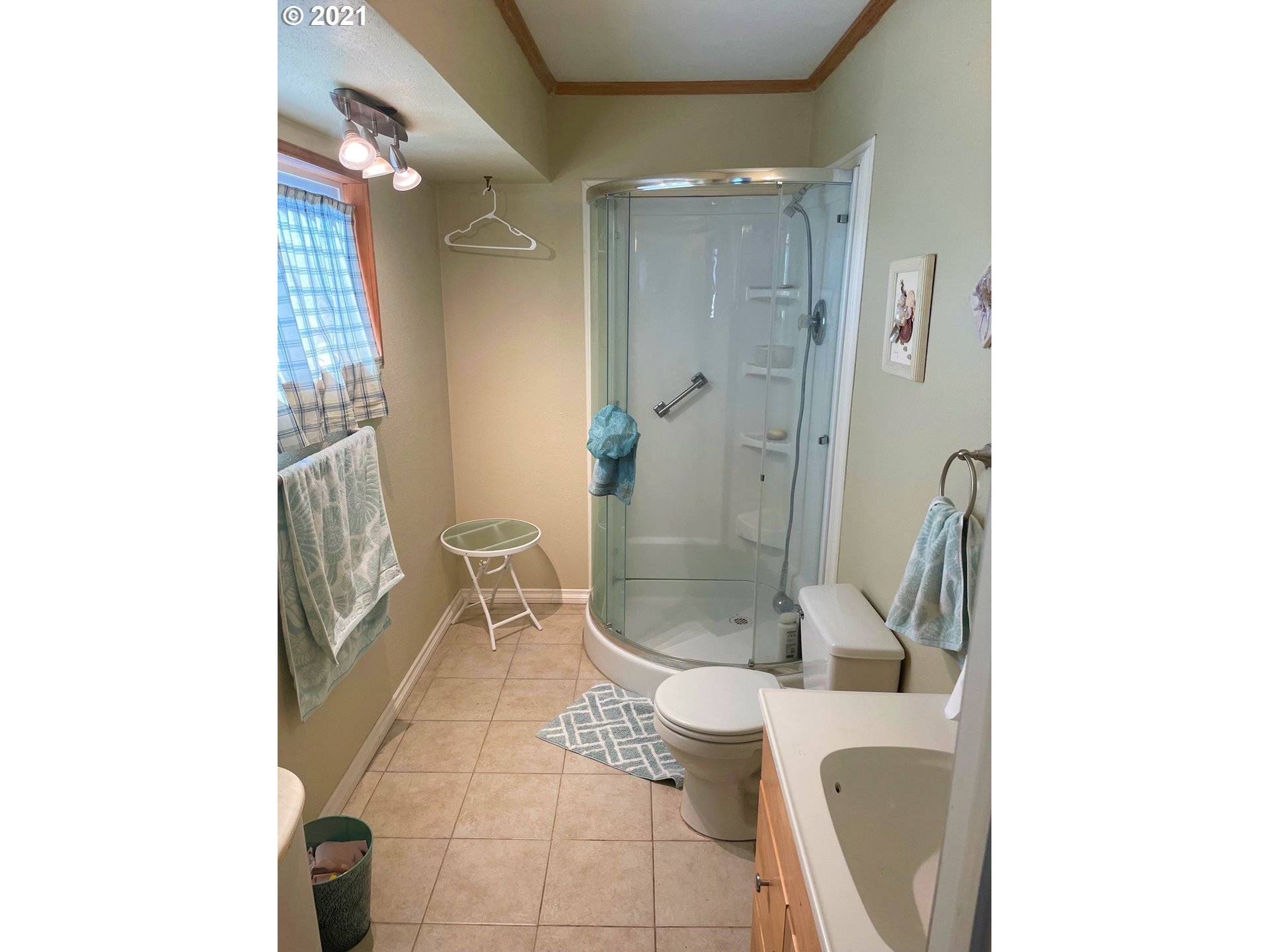 1451 Water Street Springfield, OR 97477 - Photo 15 of 23 a bathroom with a granite countertop shower and a sink