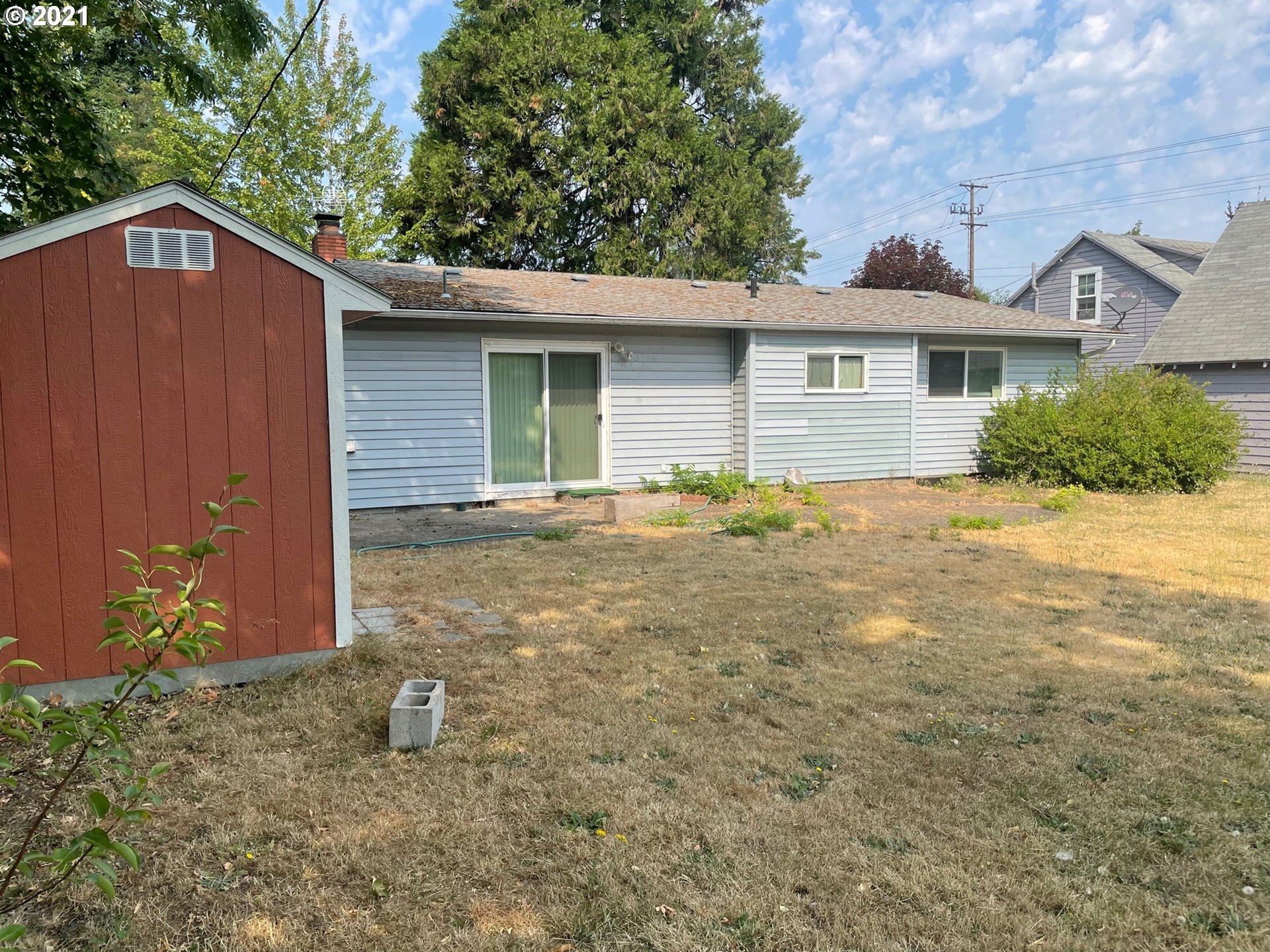 1451 Water Street Springfield, OR 97477 - Photo 20 of 23 a front view of a house with a yard