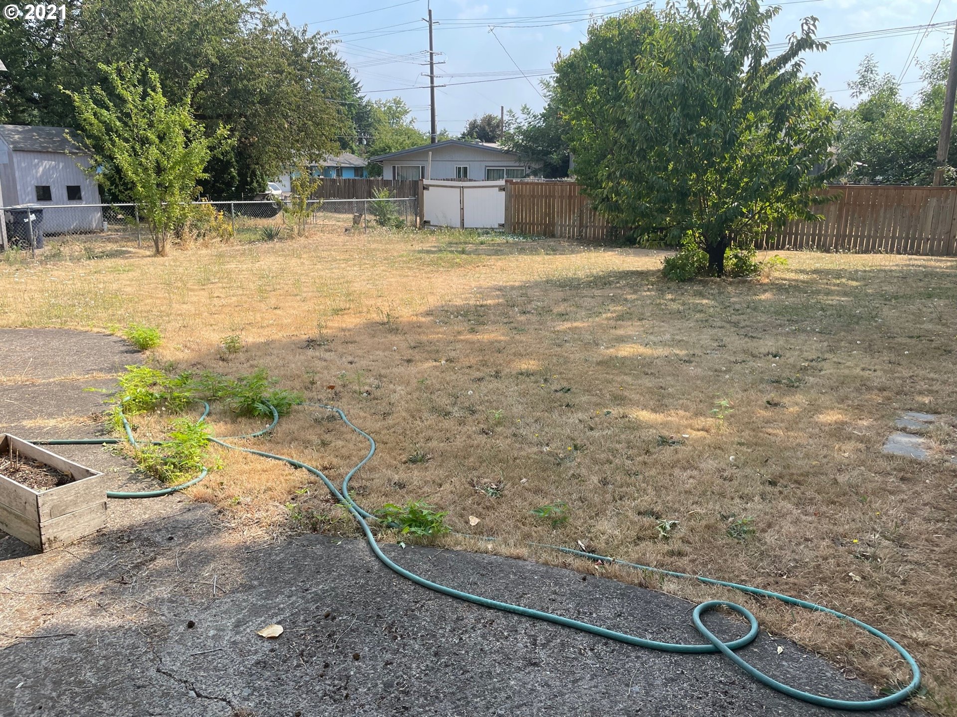 1451 Water Street Springfield, OR 97477 - Photo 22 of 23 a backyard of a house with barbeque oven
