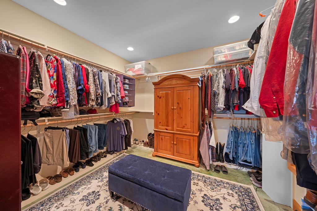 2320 Fiedler Road Harper, TX 78631 - Photo 23 of 78 a view of walk in closet with clothes