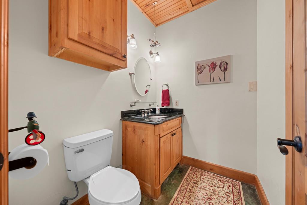 2320 Fiedler Road Harper, TX 78631 - Photo 29 of 78 a bathroom with a toilet a sink and a shower