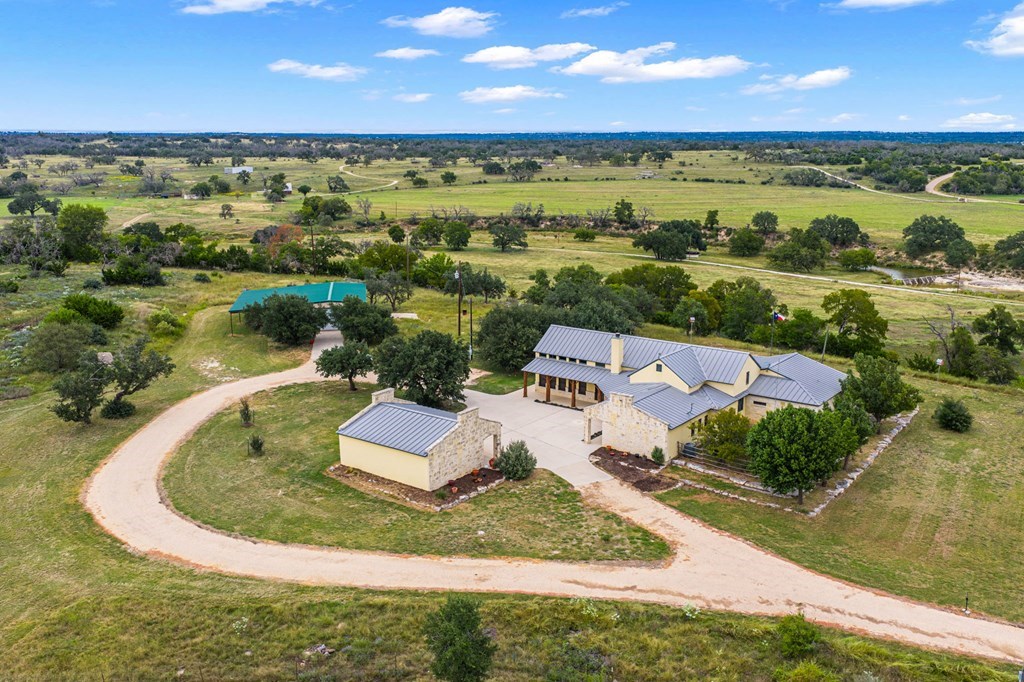 2320 Fiedler Road Harper, TX 78631 - Photo 3 of 78 an aerial view of a house with a lake view