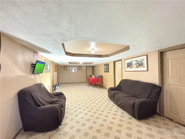 a living room with furniture and a couch