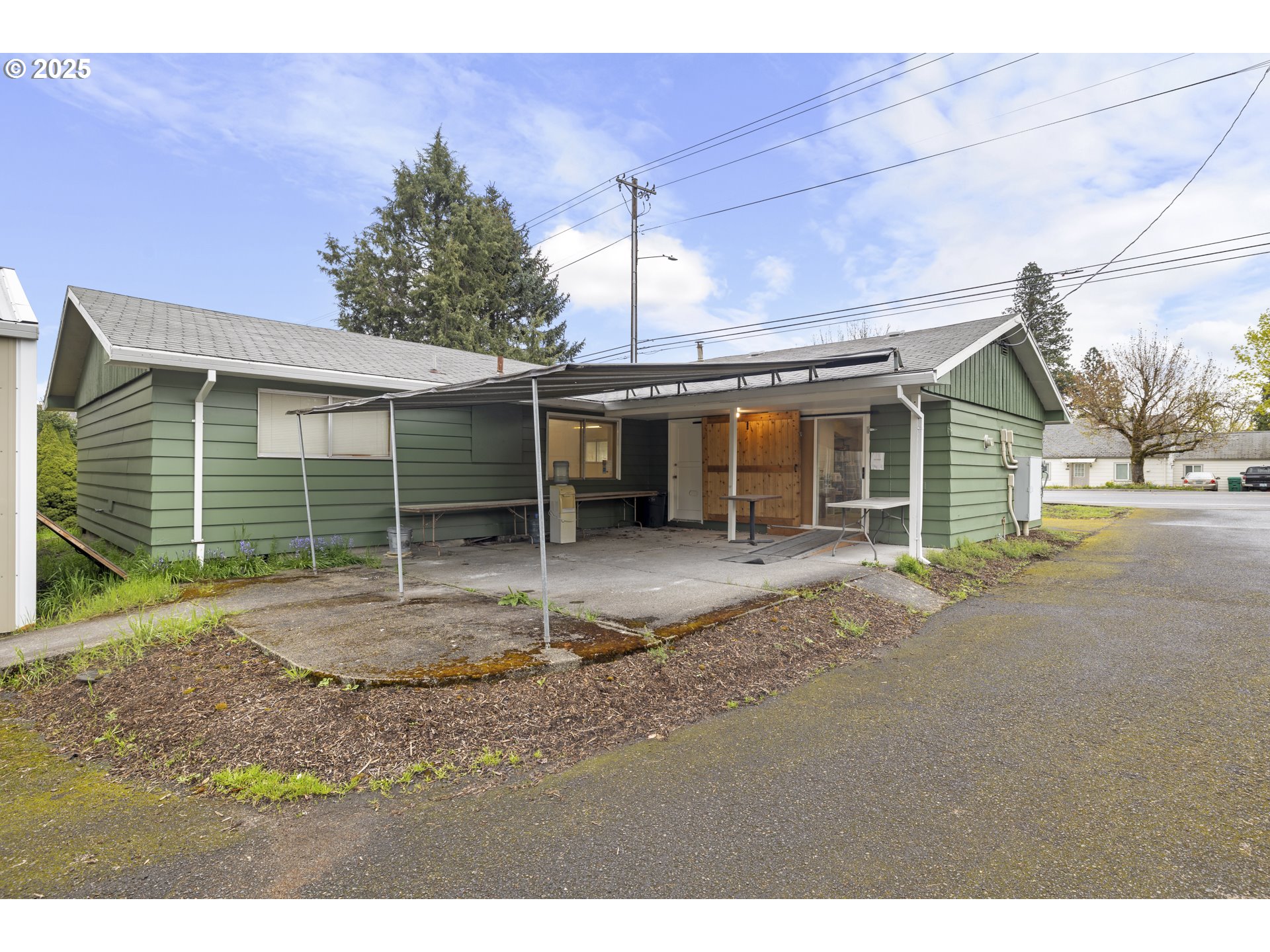 4015 Southwest 185th Avenue Beaverton, OR 97078 - Photo 15 of 47 a view of a house with a backyard and porch
