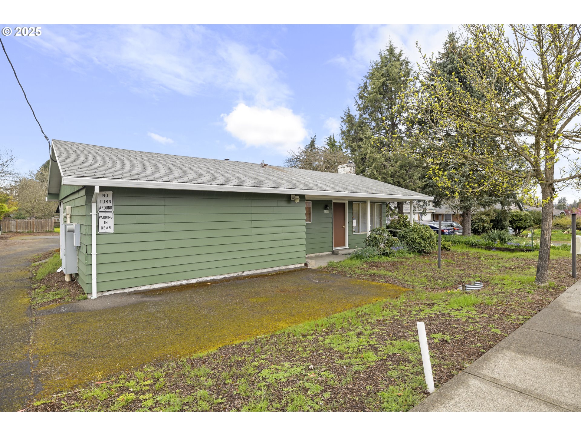 4015 Southwest 185th Avenue Beaverton, OR 97078 - Photo 17 of 47 a view of a house with a backyard