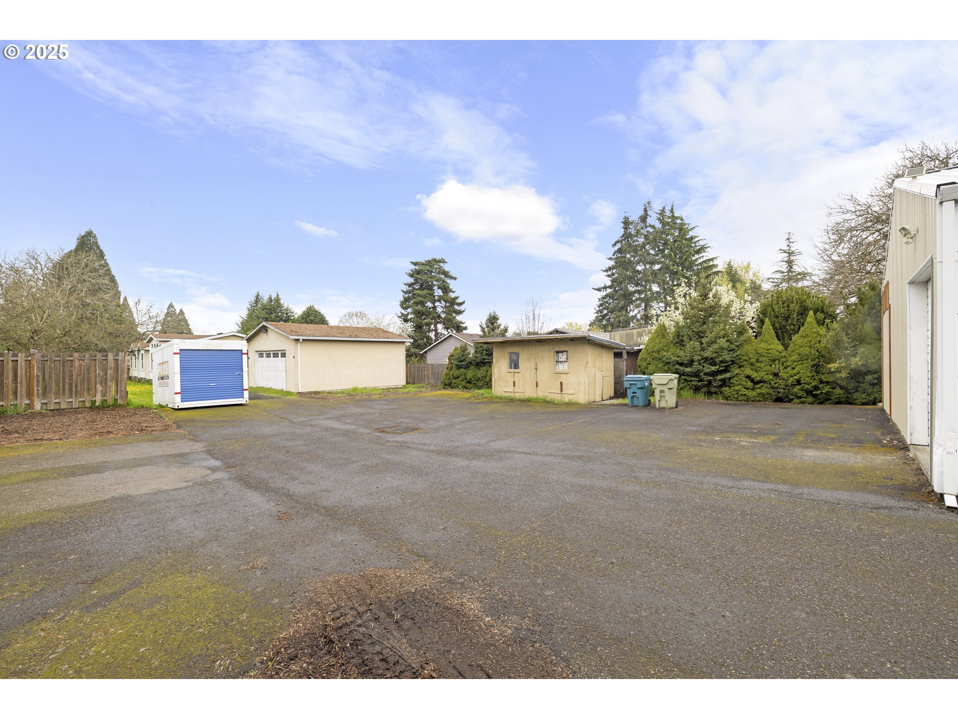 4015 Southwest 185th Avenue Beaverton, OR 97078 - Photo 24 of 47 a view of a house with a yard and a garage