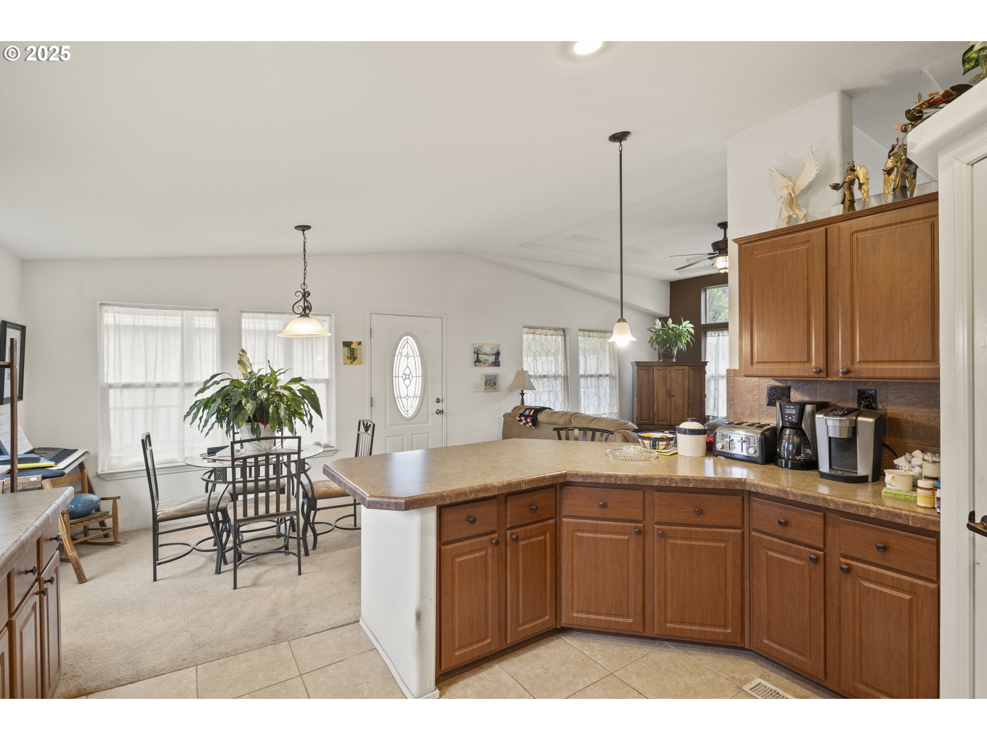 4015 Southwest 185th Avenue Beaverton, OR 97078 - Photo 32 of 47 a kitchen with a sink cabinets and appliances