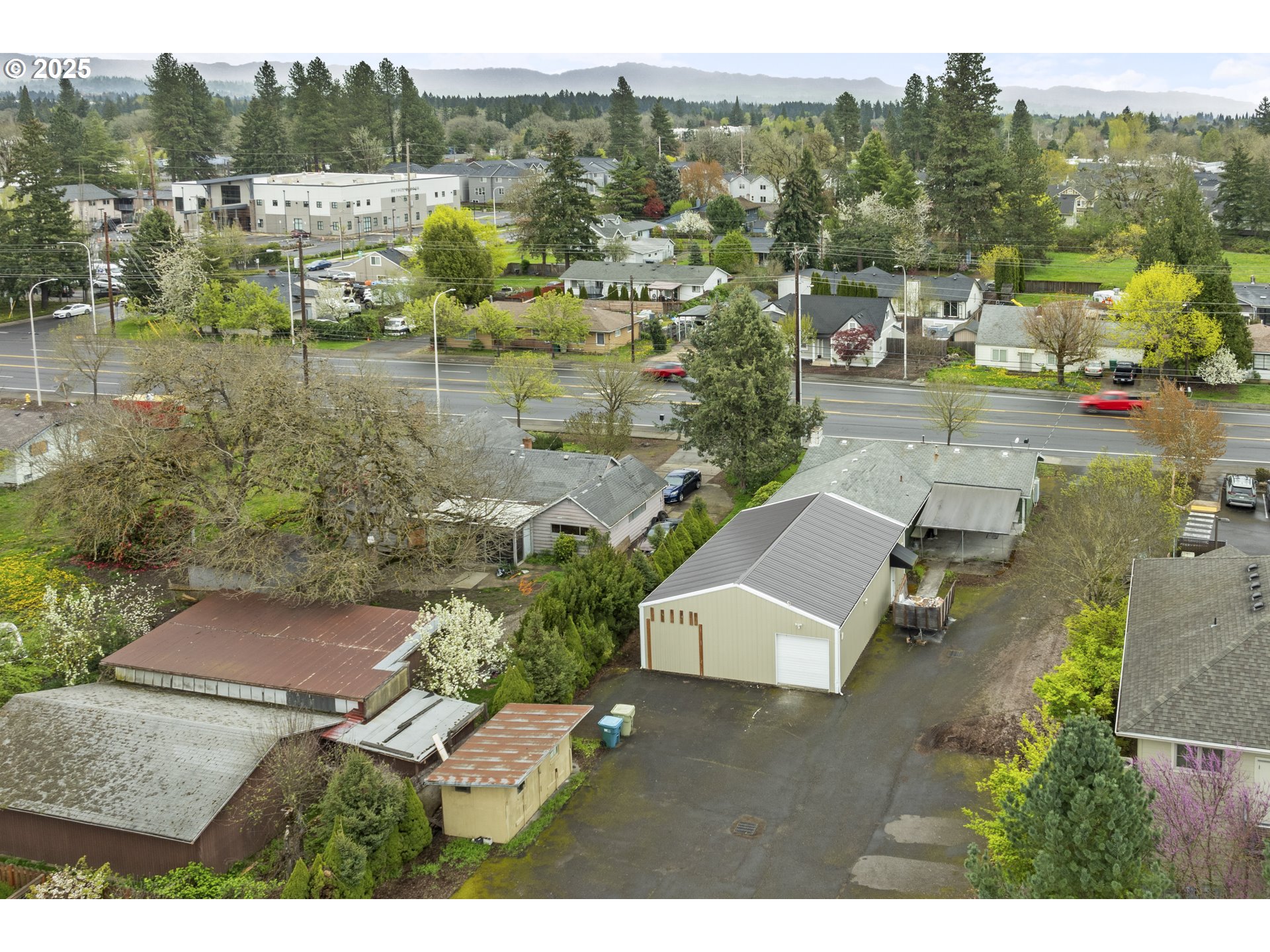 4015 Southwest 185th Avenue Beaverton, OR 97078 - Photo 45 of 47 an aerial view of residential houses with outdoor space and lake view