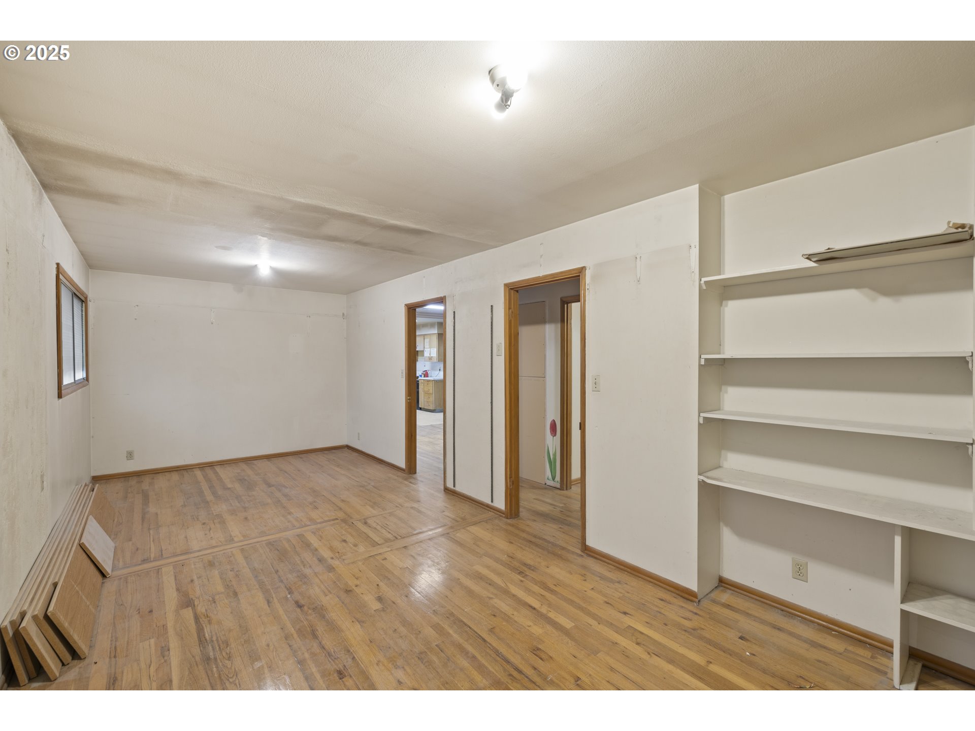 4015 Southwest 185th Avenue Beaverton, OR 97078 - Photo 10 of 47 a view of an empty room with a window