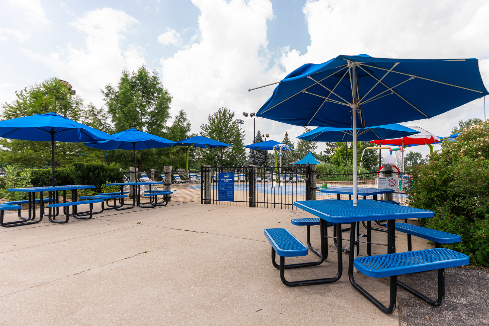 413 Oak Street Elmhurst, IL 60126 - Photo 34 of 38 a view of a swimming pool with a table and chairs under an umbrella