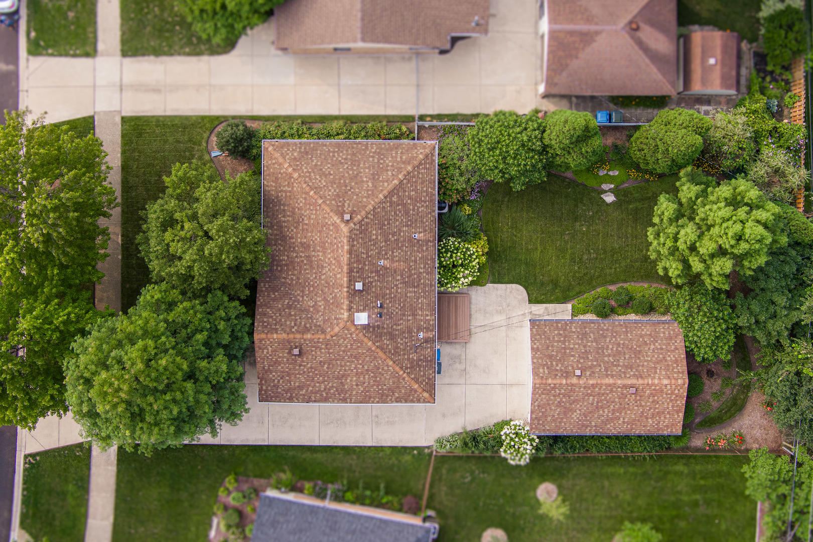 413 Oak Street Elmhurst, IL 60126 - Photo 4 of 38 an aerial view of a house with a yard and outdoor seating