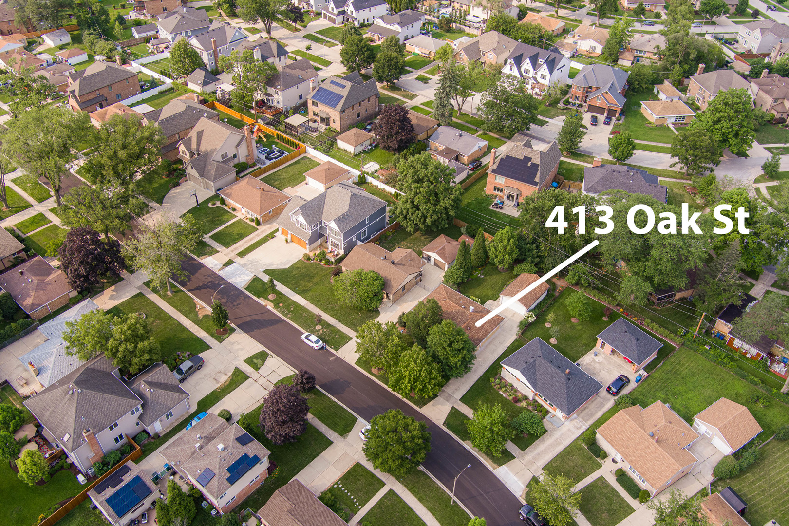 413 Oak Street Elmhurst, IL 60126 - Photo 5 of 38 an aerial view of a house with a yard