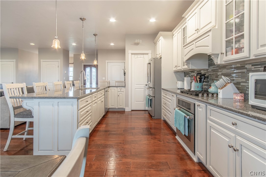 20892 Strickland Road Wilna, NY 13619 - Photo 14 of 40 Kitchen with stainless s appliances. Walk-in pantr