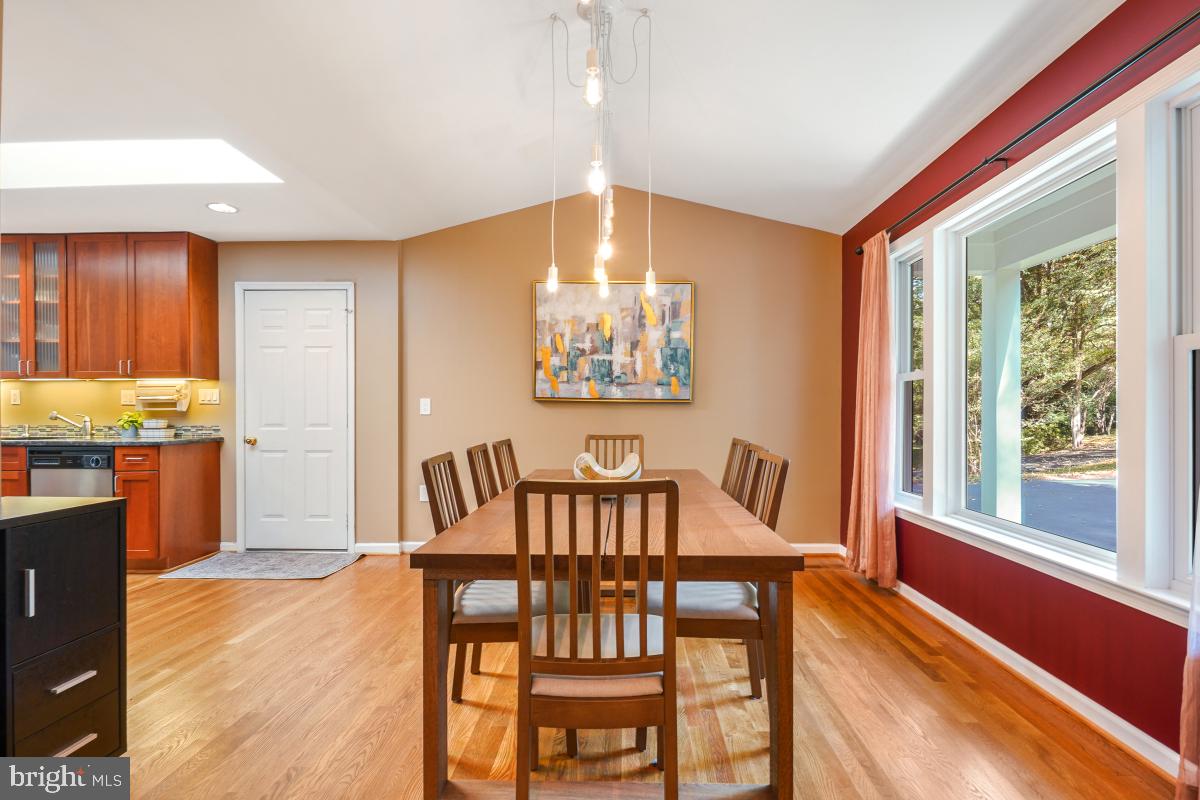 10411 Adel Road Oakton, VA 22124 - Photo 4 of 27 Dining room has contemporary drop lighting.