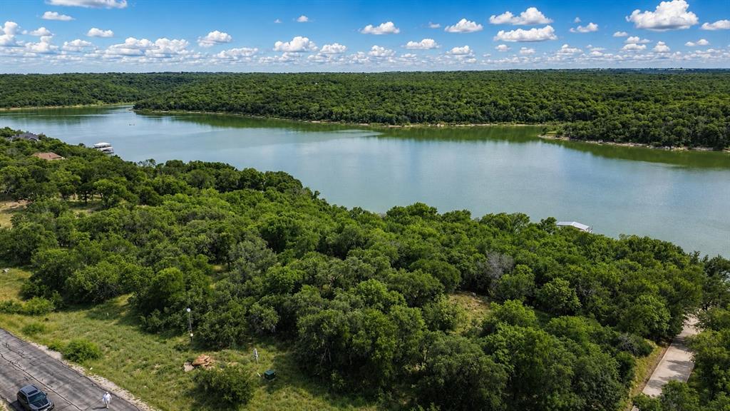 274 Ridgeline Drive Chico, TX 76431 - Photo 3 of 9 an aerial view of a house with a lake view