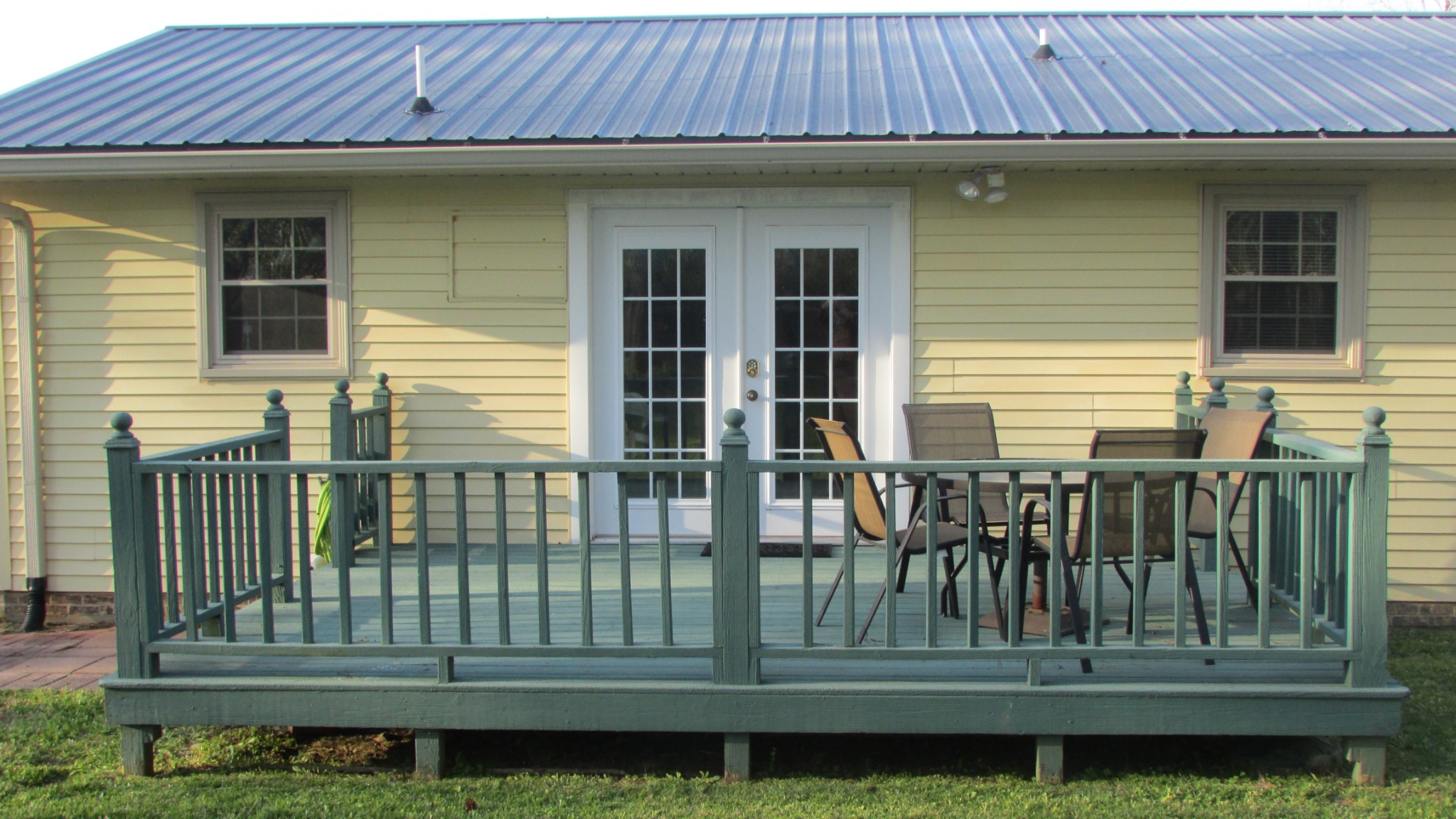 3455 Gimlet Road Lawrenceburg, TN 38464 - Photo 2 of 28 a view of front door and a bench