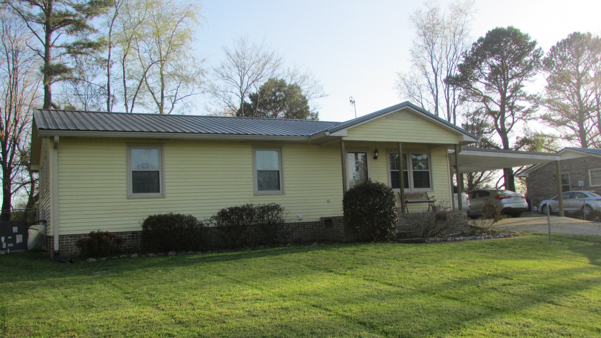 3455 Gimlet Road Lawrenceburg, TN 38464 - Photo 22 of 28 a front view of a house with a garden