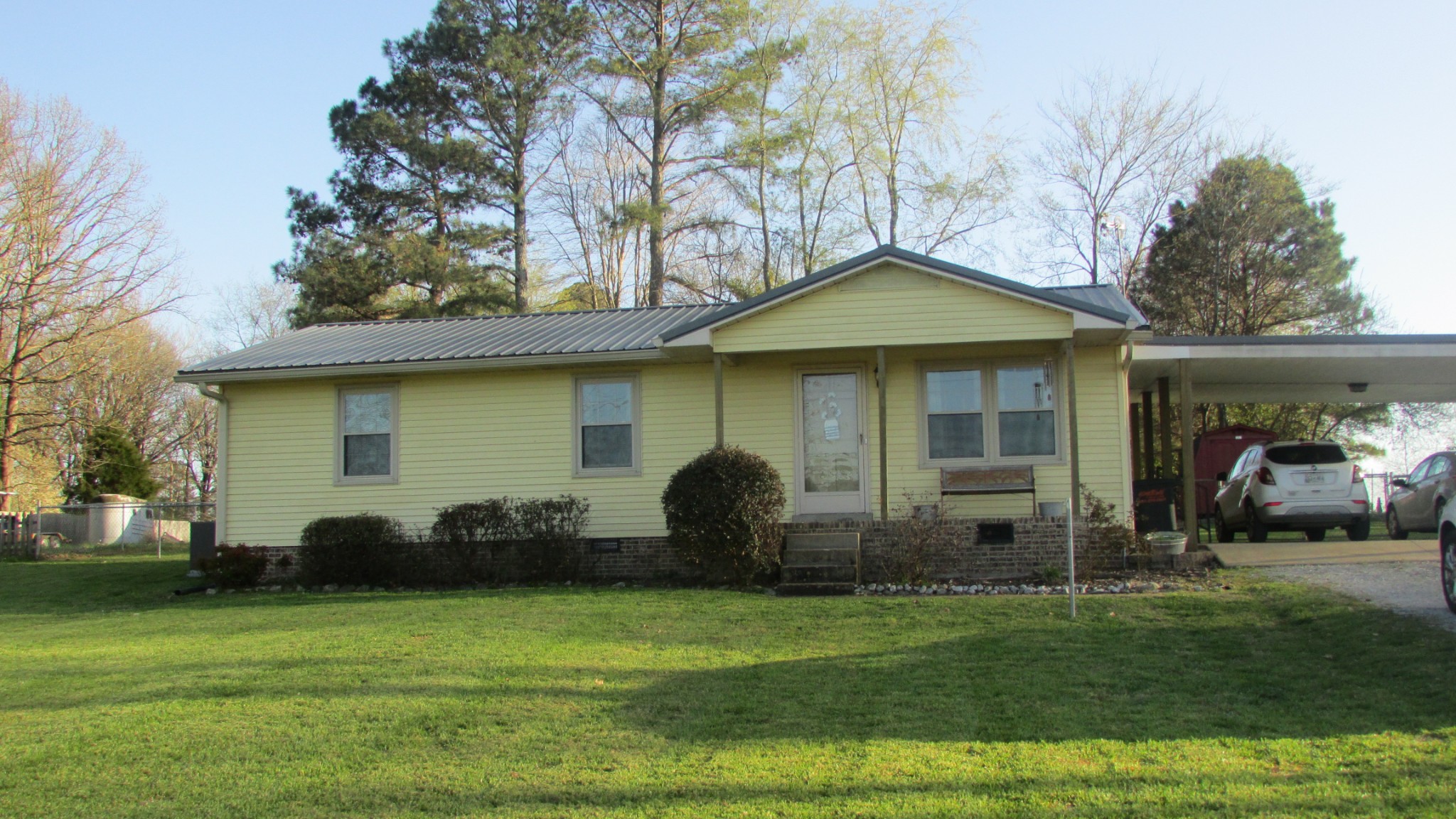 3455 Gimlet Road Lawrenceburg, TN 38464 - Photo 24 of 28 a front view of a house with a garden
