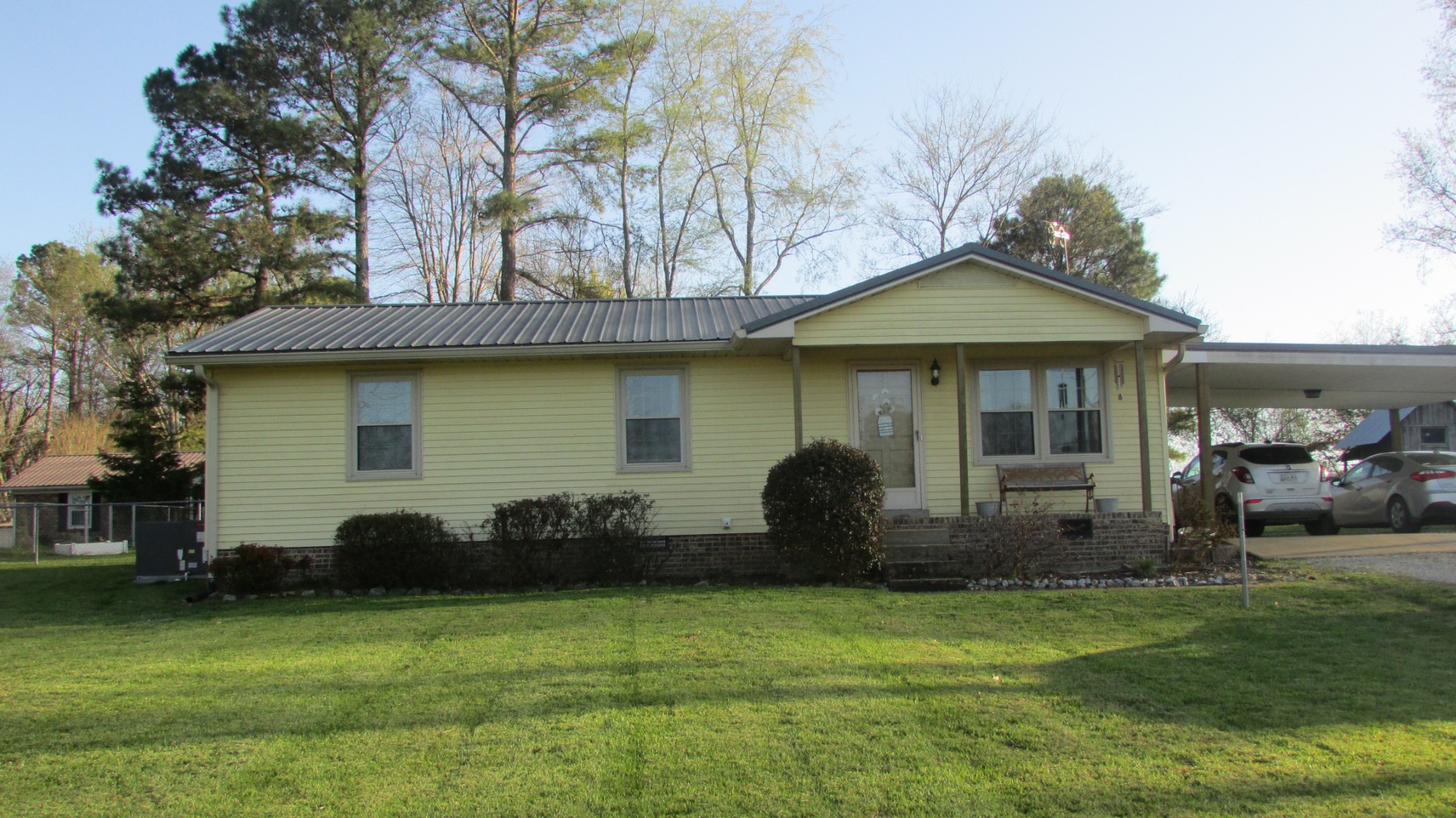 3455 Gimlet Road Lawrenceburg, TN 38464 - Photo 25 of 28 a front view of a house with a garden